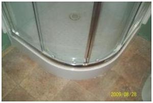 Standing shower and flooring.